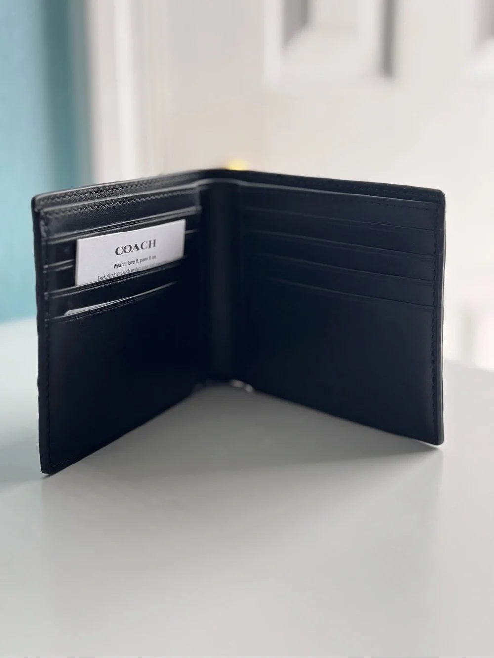 Coach Black Embossed Signature Leather Bifold Wallet